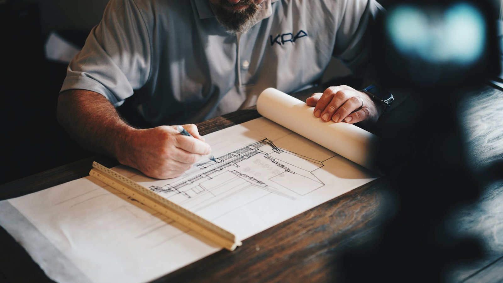 Architect working on technical drawings